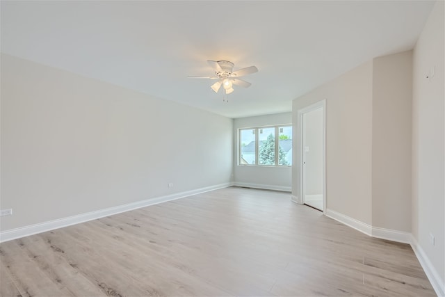 unfurnished room with light hardwood / wood-style floors and ceiling fan