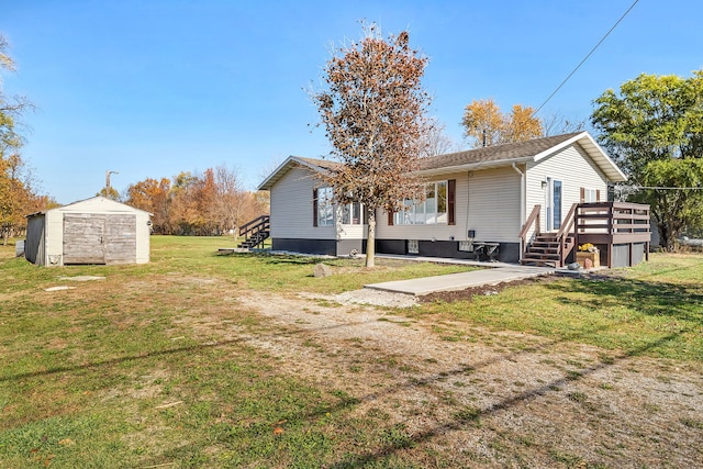 exterior space featuring a storage shed and a yard