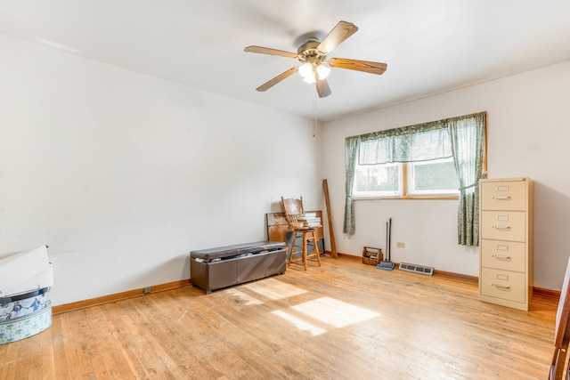 miscellaneous room featuring hardwood / wood-style flooring and ceiling fan