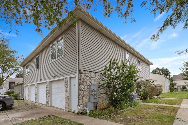 view of home's exterior with a garage