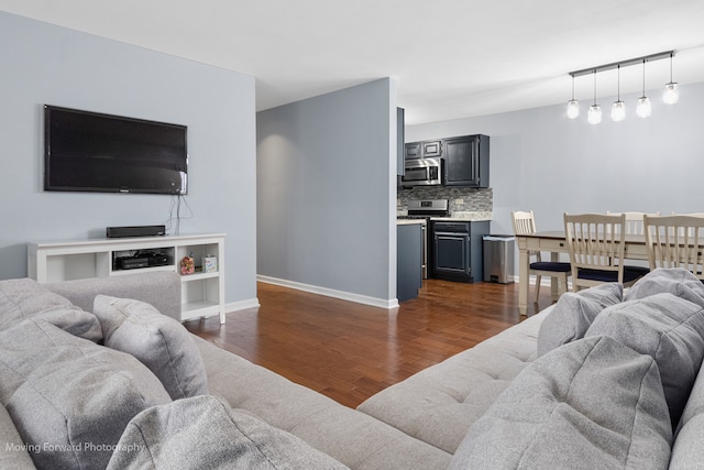 living room with dark wood-type flooring