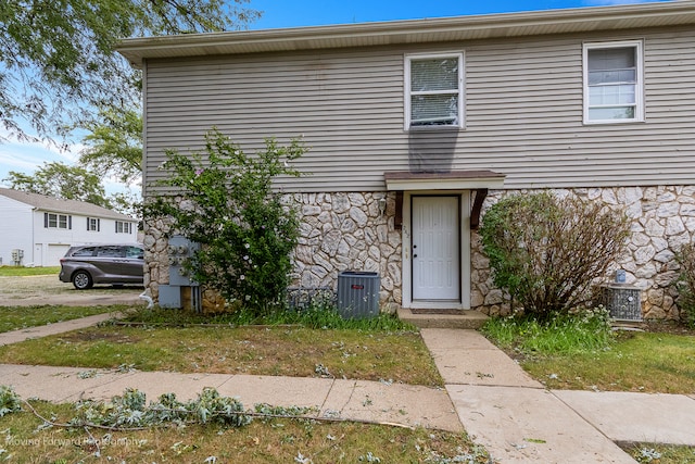 view of front of property featuring central AC unit