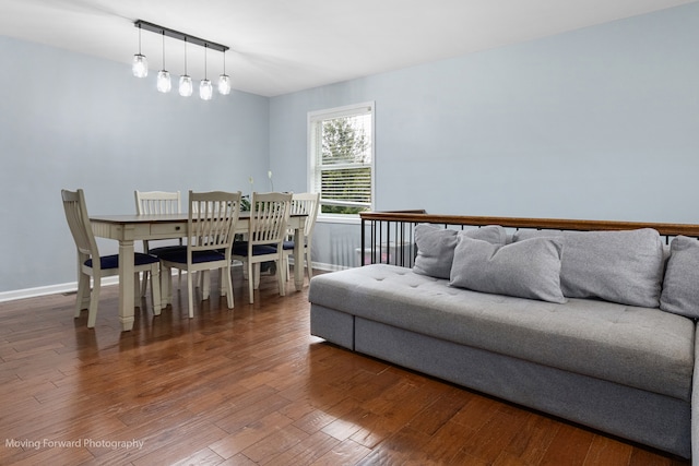 dining area with hardwood / wood-style flooring