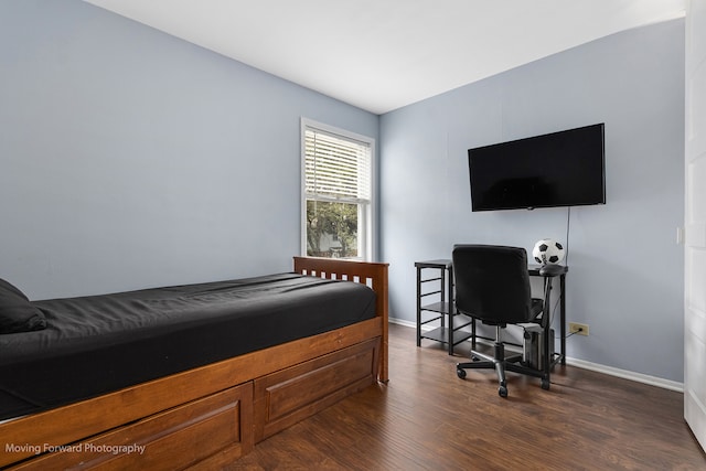 bedroom featuring dark hardwood / wood-style floors