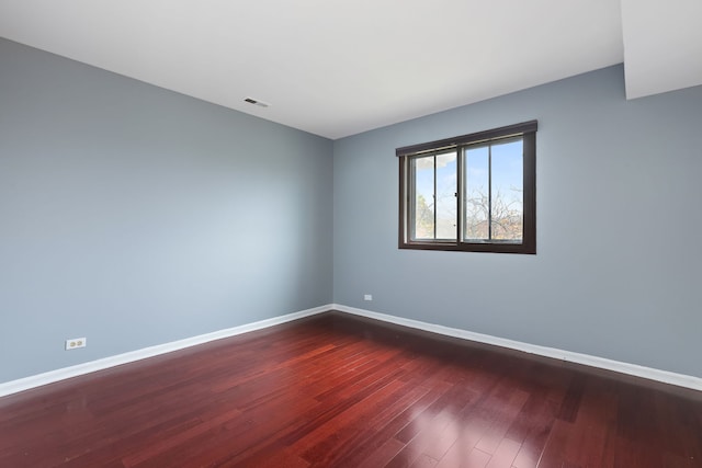 empty room featuring hardwood / wood-style floors