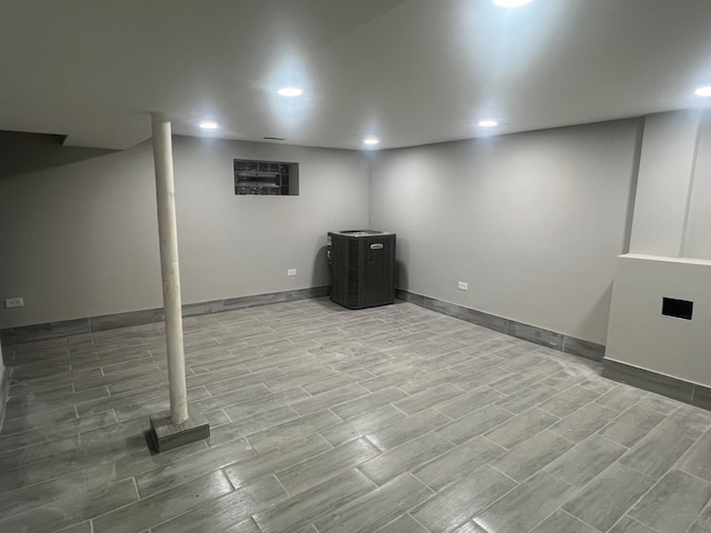 basement featuring light hardwood / wood-style floors