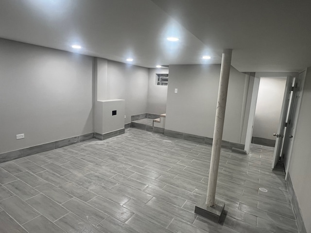 basement with light wood-type flooring