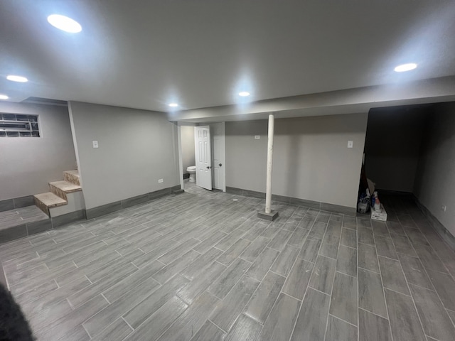 basement featuring light hardwood / wood-style floors