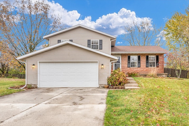 view of front facade with a garage and a front yard