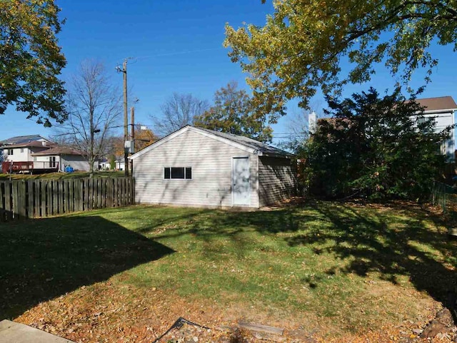 exterior space with a lawn and an outbuilding