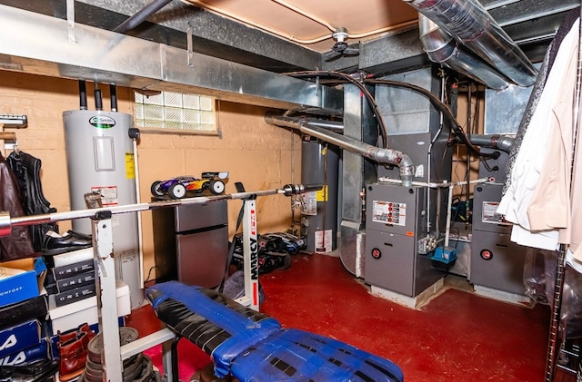 utility room featuring electric water heater and water heater