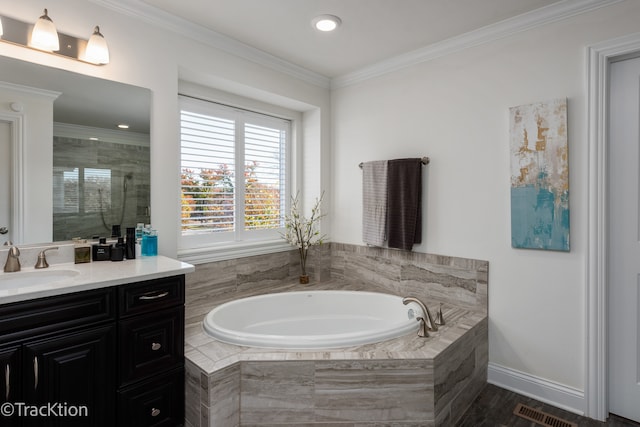 bathroom with ornamental molding, hardwood / wood-style floors, vanity, and plus walk in shower