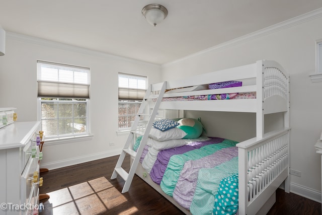 bedroom with dark wood-type flooring and crown molding