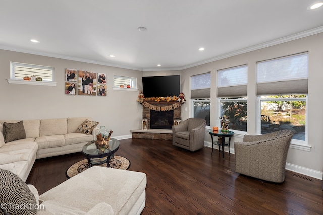 living room with ornamental molding, a fireplace, and dark hardwood / wood-style flooring