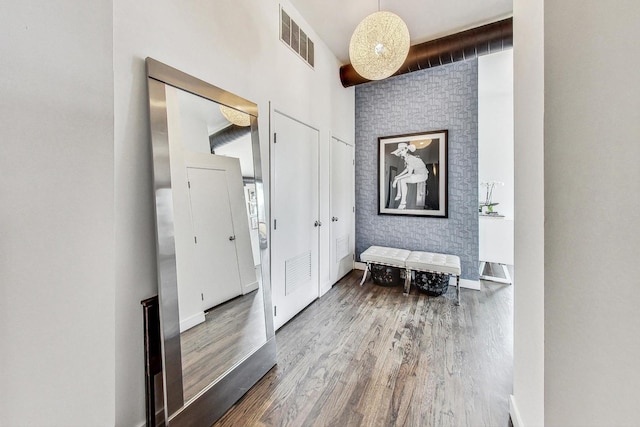 foyer entrance with hardwood / wood-style floors