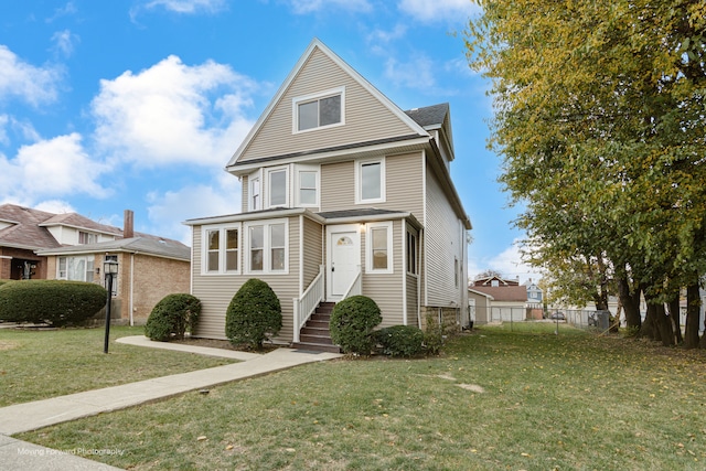 view of front of house with a front lawn