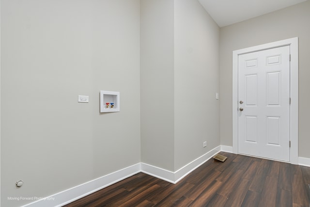 washroom featuring hookup for a washing machine and dark hardwood / wood-style flooring