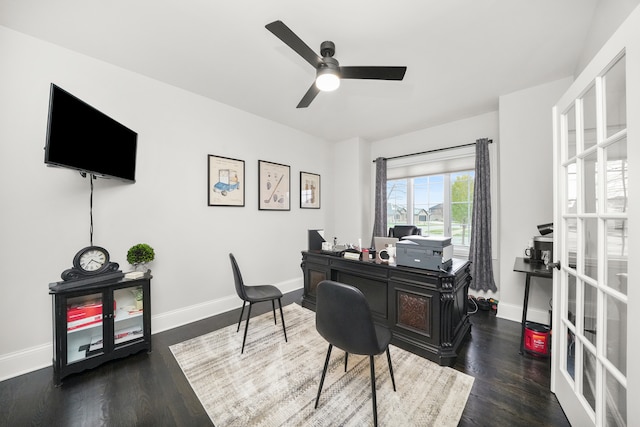 home office with dark hardwood / wood-style floors and ceiling fan