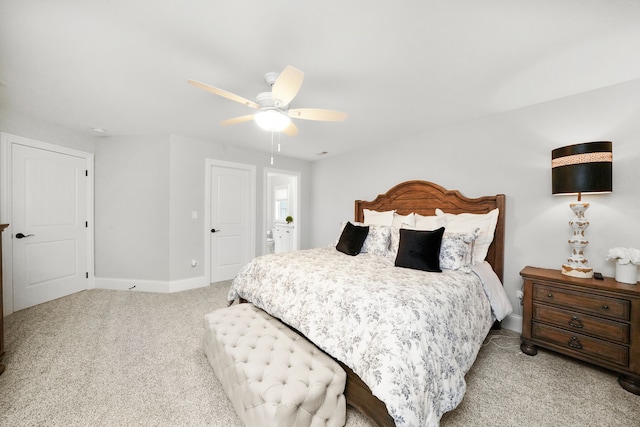 bedroom featuring ceiling fan and light colored carpet