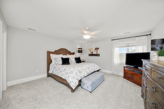 bedroom with light colored carpet and ceiling fan