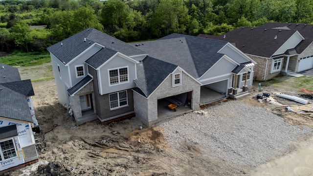 view of front of property featuring a garage and a front yard