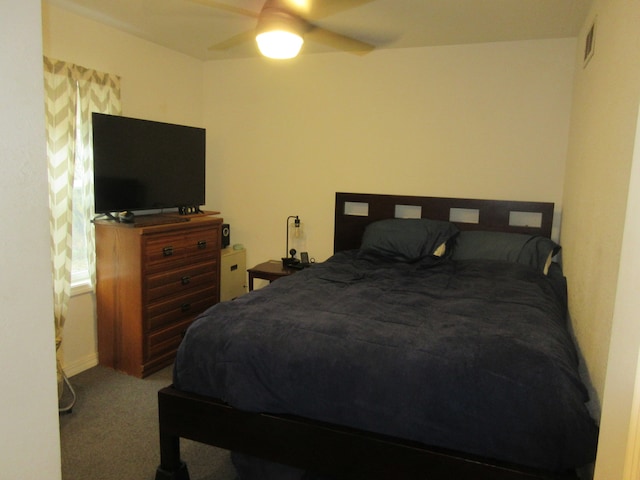 bedroom featuring ceiling fan and carpet flooring