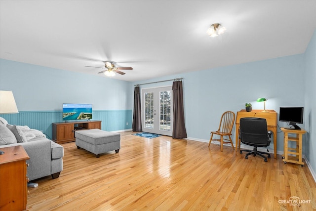 living room with french doors, light hardwood / wood-style flooring, and ceiling fan