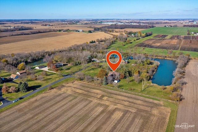 bird's eye view featuring a rural view and a water view