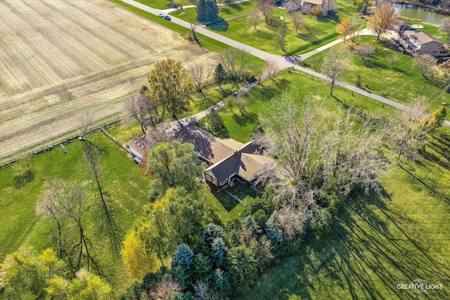 bird's eye view with a rural view and a water view