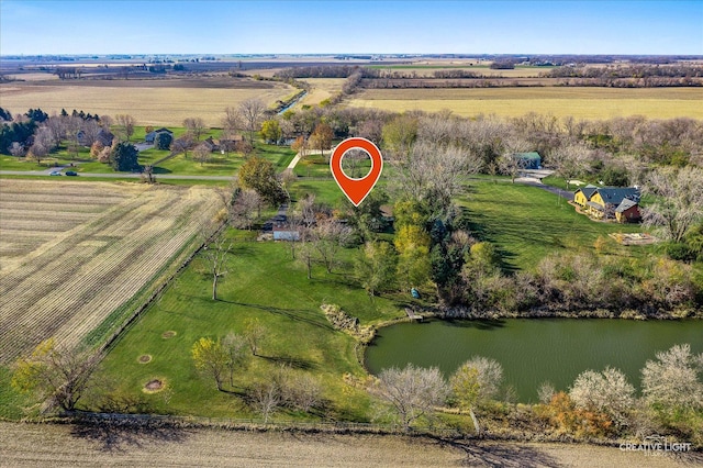 aerial view with a rural view and a water view