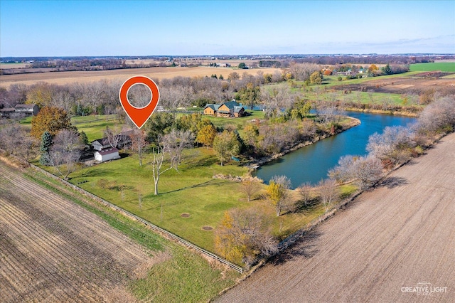 aerial view featuring a rural view and a water view