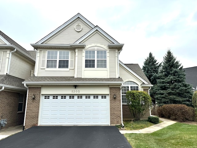 view of front property with a garage