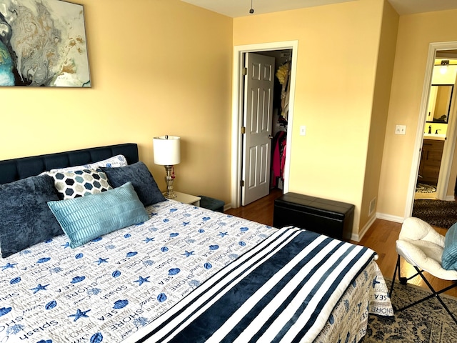 bedroom featuring dark hardwood / wood-style flooring