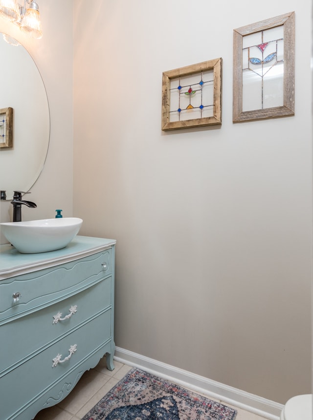 bathroom with vanity and tile patterned flooring