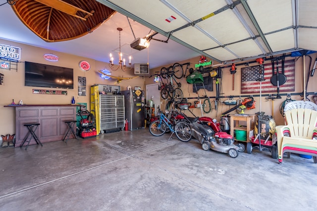 garage featuring a garage door opener and stainless steel refrigerator