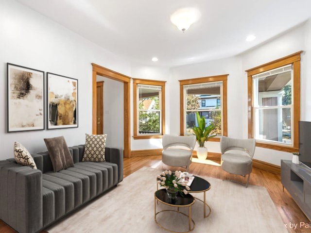 sitting room featuring a healthy amount of sunlight and light wood-type flooring