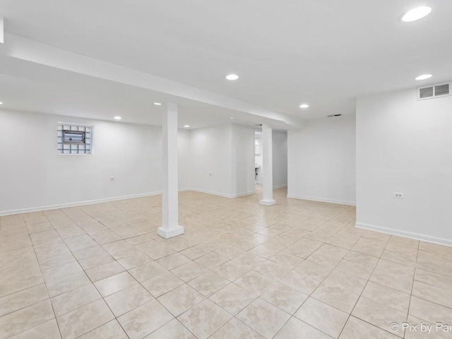 basement with light tile patterned floors