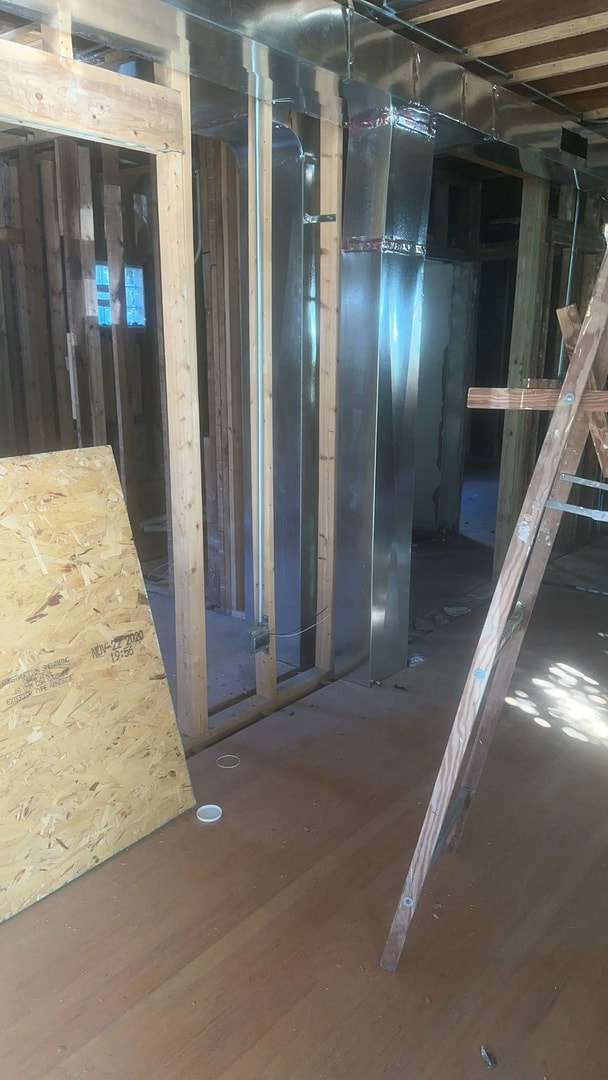 basement featuring wood-type flooring