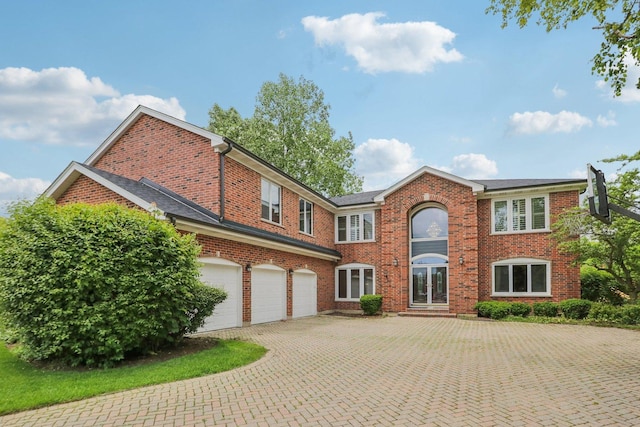 view of front of property featuring a garage