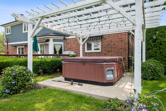 exterior space featuring a hot tub and a pergola