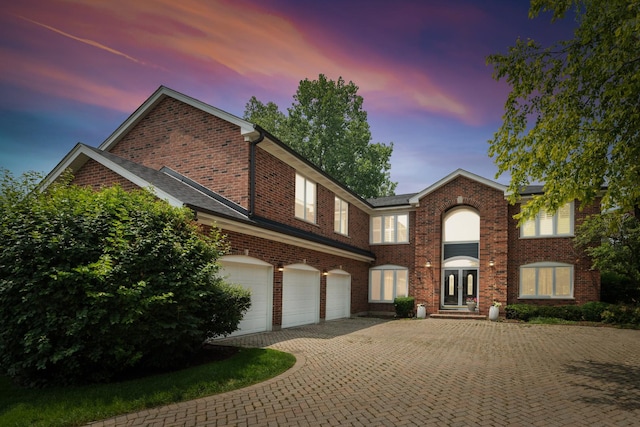 view of front of home with a garage