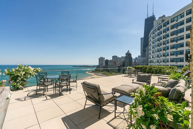 view of patio / terrace with a water view