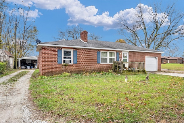 ranch-style house featuring cooling unit, a front lawn, and a carport