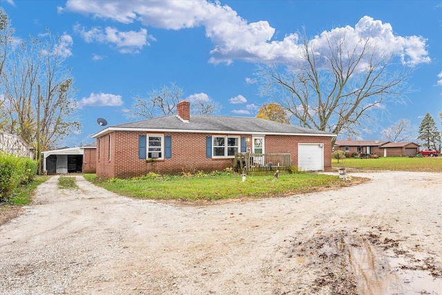 view of front of house featuring brick siding, a chimney, and dirt driveway