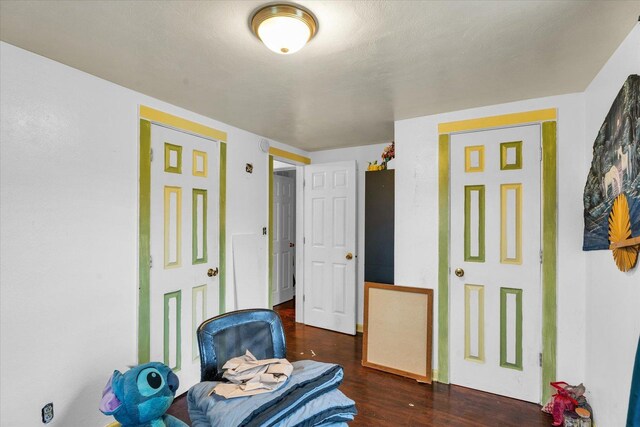 empty room with hardwood / wood-style flooring and ceiling fan