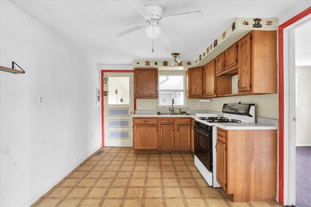 carpeted empty room with a textured ceiling and ceiling fan