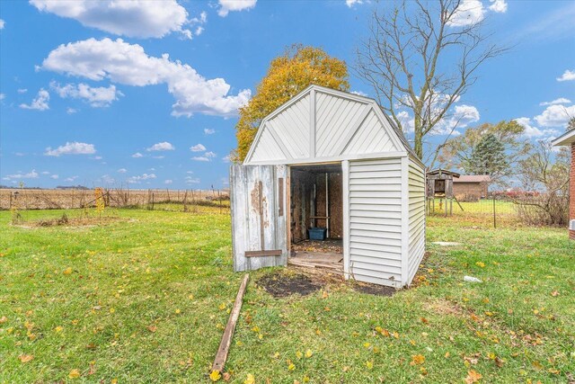 view of home's exterior featuring a yard and a playground