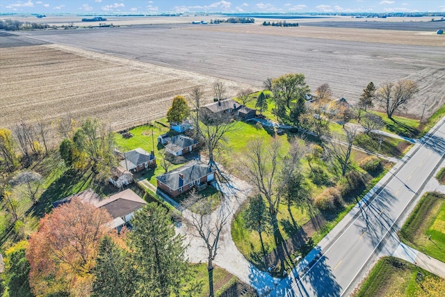 birds eye view of property featuring a rural view