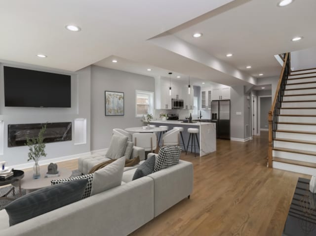 living room with hardwood / wood-style flooring