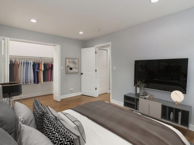 bedroom featuring hardwood / wood-style flooring and a closet